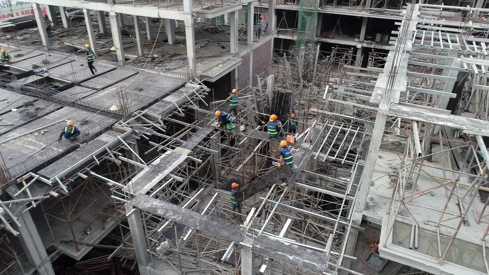 Crews working across a large structure